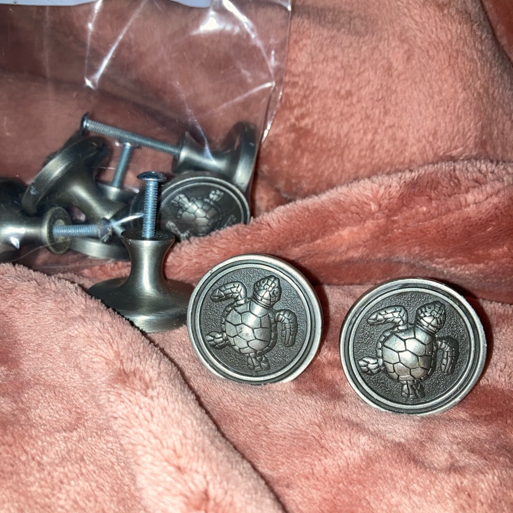 Assortment of Sea Life brushed satin pewter knobs 59 in all